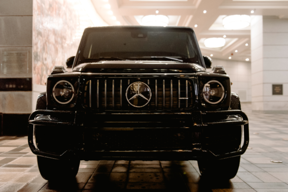 Black Mercedes-Benz luxury SUV parked indoors