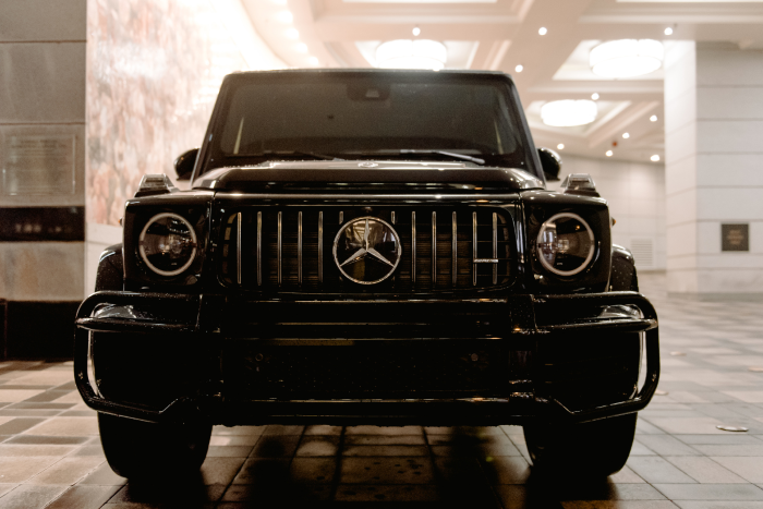Black Mercedes-Benz luxury SUV parked indoors
